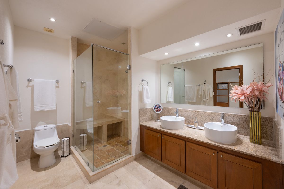 Second guest bathroom with glass shower and double vanity, Penthouse 2
